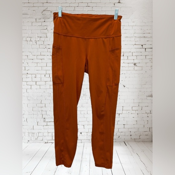 Athleta salutation stash pocket leggings in foliage orange - Picture 4 of 8